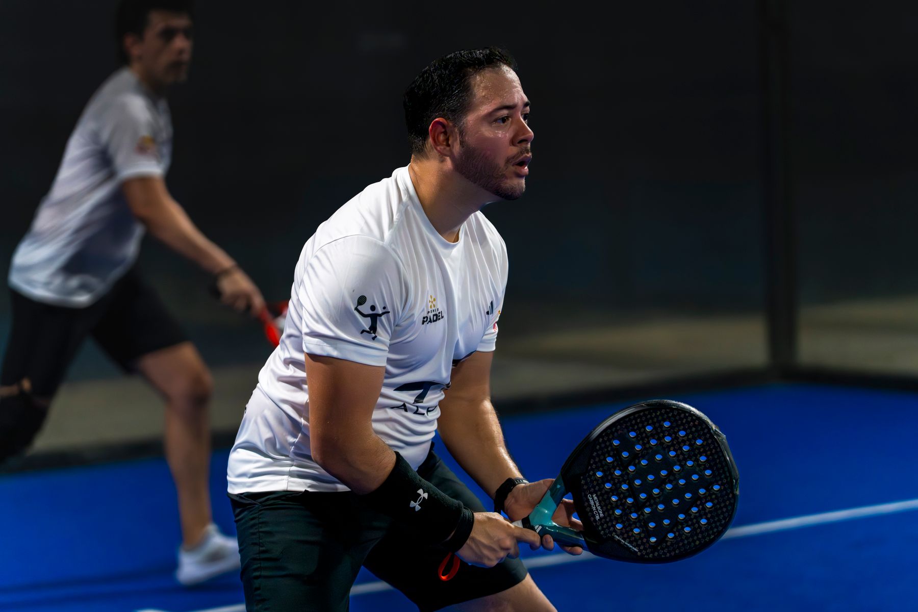 Two players waiting at the net